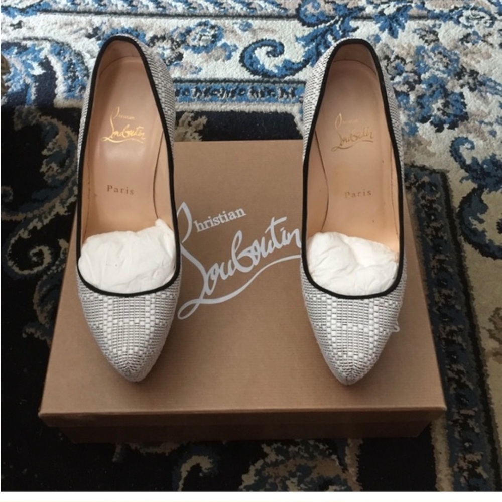 Brand new authentic, shoes, never worn White, and  black Christian Louboutin